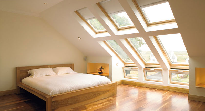 Click here to view this image of Beautiful & Easy to Use in full screen with accompanying information. Short version: Combine vertical and sloping Natural Pine Roof Windows to extend the possibilities for view and daylight. Photograph of Beautiful & Easy to Use