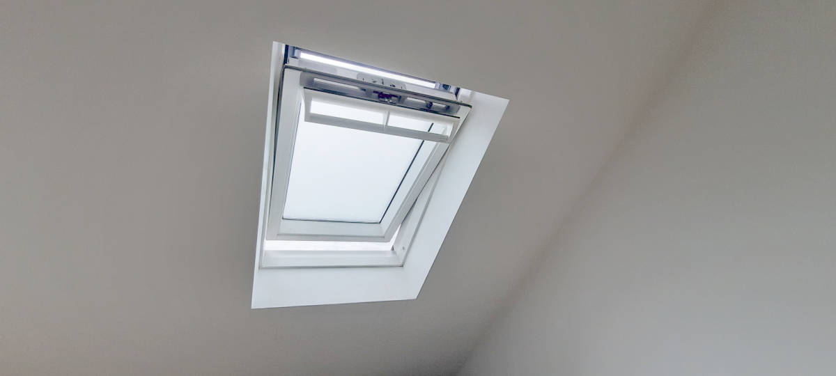 Image of centre pivot window smaller side <h2>2021-09-24 - Sussex Bungalow Loft Transformation with 2 Velux Windows</h2>