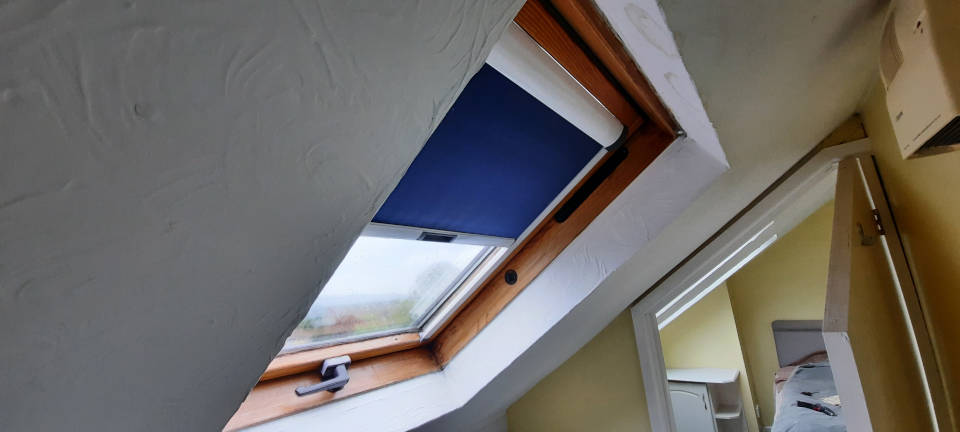 image shows: Installation of a dozen VELUX roof windows