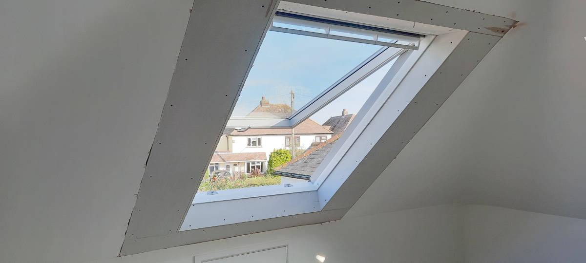 Image of top pivot velux window for maximum ventilation view <h2>2021-09-24 - Sussex Bungalow Loft Transformation with 2 Velux Windows</h2>